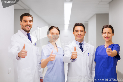 Image of medics or doctors at hospital showing thumbs up