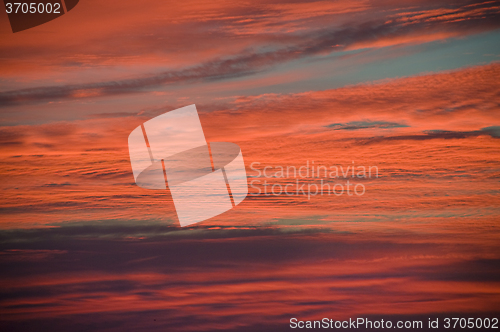 Image of Pink and orange clouds at sunrise
