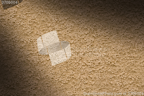 Image of Stucco wall texture lit diagonally