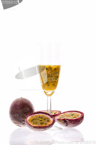 Image of Purple Passion Fruit And Its Pulp Over White 