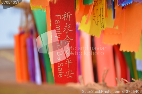 Image of Blessing ribbons hang outside in Kek Lok Si, Penang