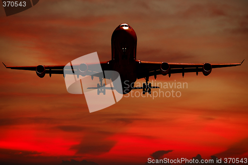 Image of Air travel - Silhouett of plane and sunset