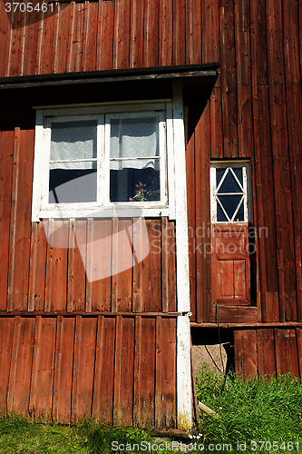 Image of red wooden Finnish house