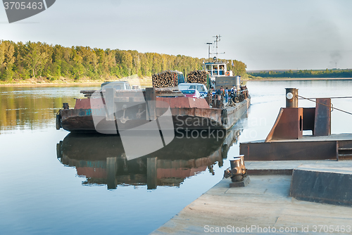 Image of Vehicle ferry comes nearer to the mooring. Russia