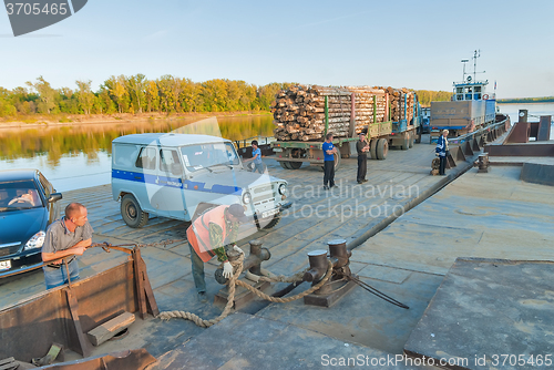 Image of Vehicle ferry comes nearer to the mooring. Russia