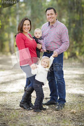 Image of Mommy and Daddy Having Fun with Baby Brother And Sister