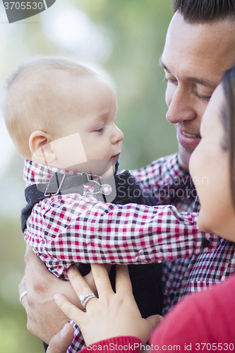 Image of Little Baby Boy Having Fun With Mother and Father Outdoors