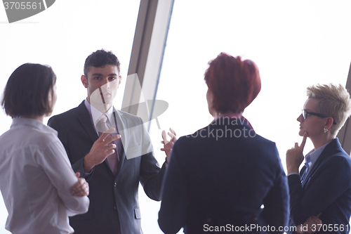 Image of business people group on meeting at modern bright office