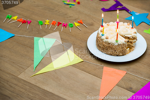 Image of Birthday Cake On Decorated Wooden Table