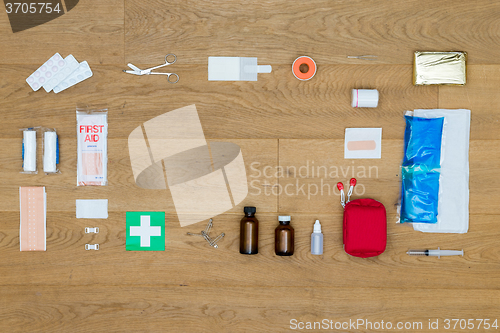 Image of First Aid Tools On Wooden Table