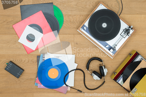 Image of Various Records With Turntable And Headphones