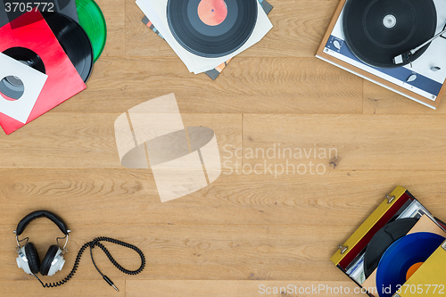 Image of Records With Turntable On Wooden Table