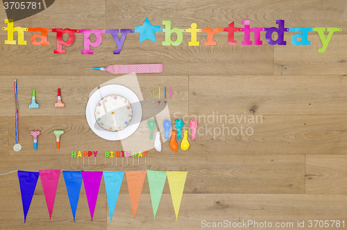 Image of Birthday Decorations On Wooden Table