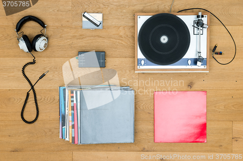 Image of Turntable With Records And Headphones On Table