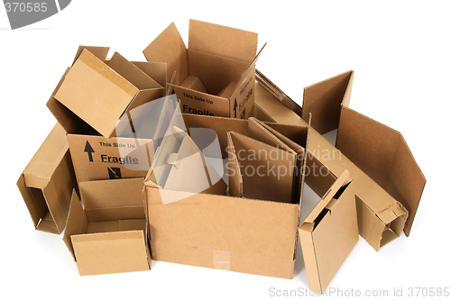 Image of Pile of open cardboard boxes