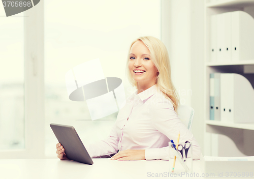 Image of smiling businesswoman or student with tablet pc