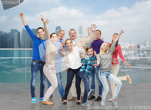Image of happy people having fun over city waterside