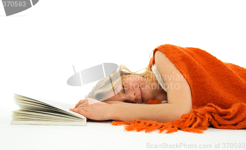 Image of Girl fallen asleep with a book