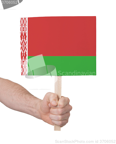 Image of Hand holding small card - Flag of Belarus
