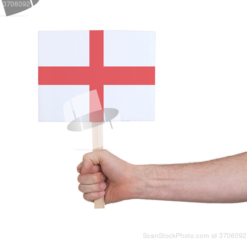 Image of Hand holding small card - Flag of England