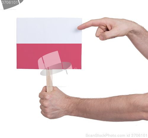 Image of Hand holding small card - Flag of Poland