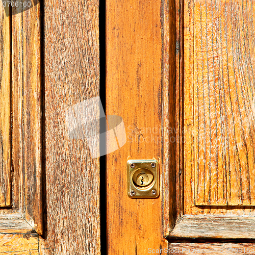 Image of  traditional   door    in italy   ancian wood and traditional  t