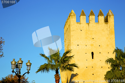 Image of old ruin in     brown construction  africa   street lamp