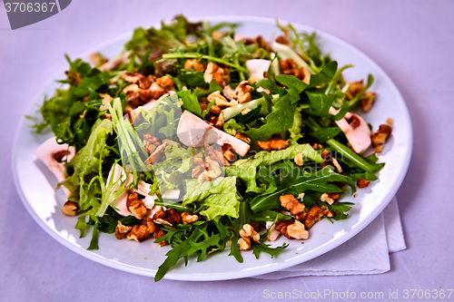 Image of salad with pear, walnuts