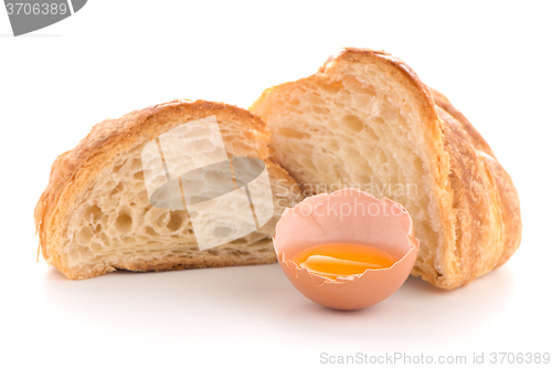 Image of Croissant and raw egg