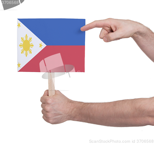 Image of Hand holding small card - Flag of Philipines