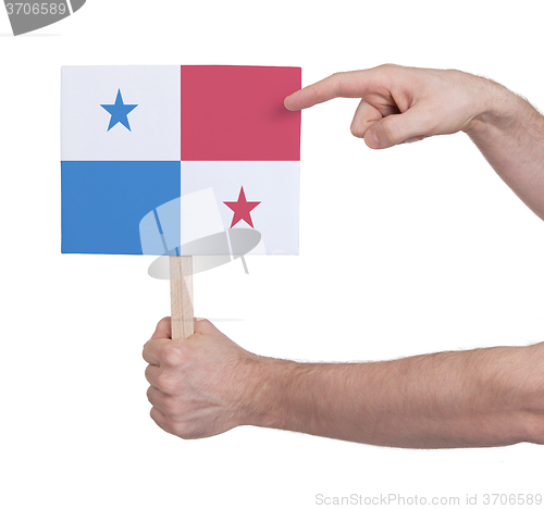 Image of Hand holding small card - Flag of Panama