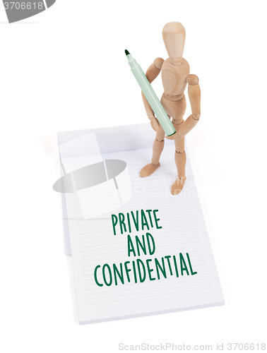 Image of Wooden mannequin writing - Private and confidential