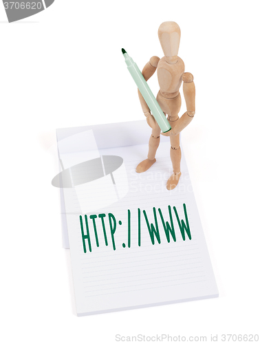 Image of Wooden mannequin writing - http www