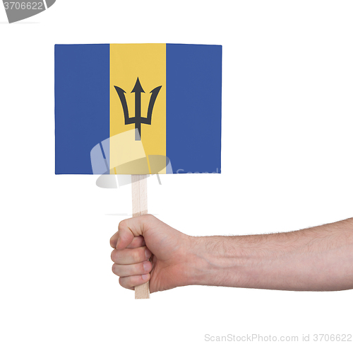 Image of Hand holding small card - Flag of Barbados