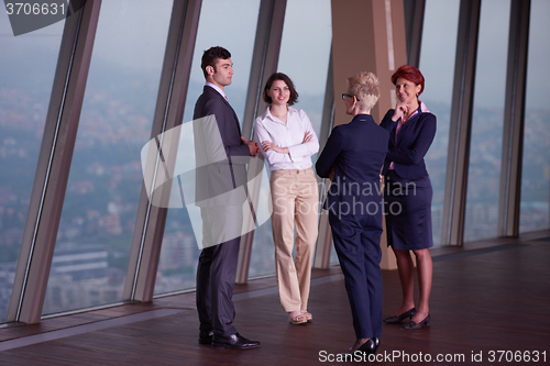 Image of business people group on meeting at modern bright office