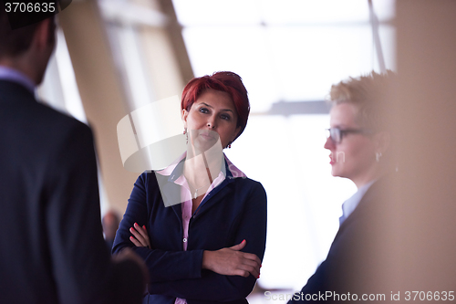 Image of business people group on meeting at modern bright office