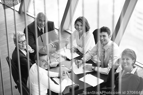Image of business people group on meeting at modern bright office