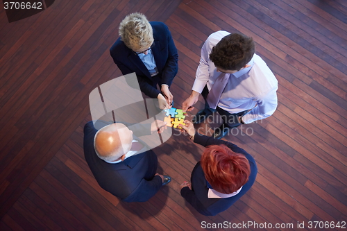 Image of assembling jigsaw puzzle