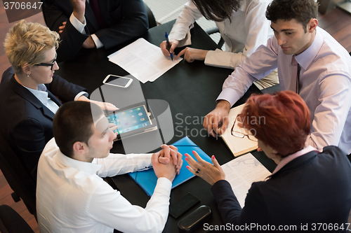 Image of business people group on meeting at modern bright office