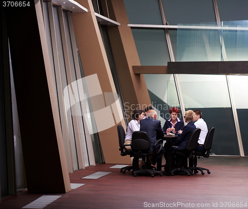 Image of business people group on meeting at modern bright office