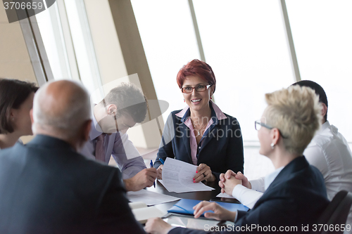 Image of business people group on meeting at modern bright office