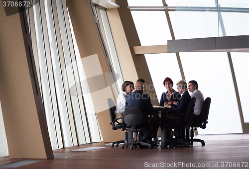 Image of business people group on meeting at modern bright office