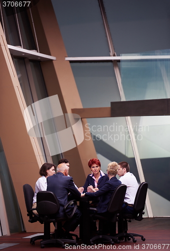 Image of business people group on meeting at modern bright office