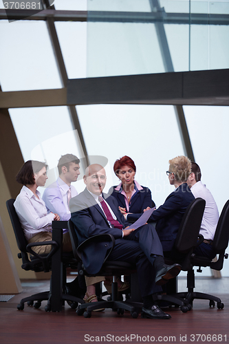 Image of business people group on meeting at modern bright office