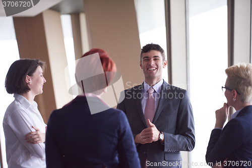 Image of business people group on meeting at modern bright office