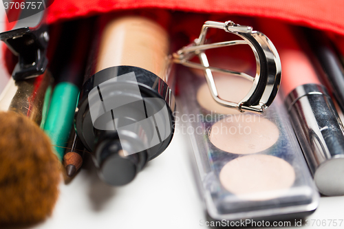 Image of close up of cosmetic bag with makeup stuff