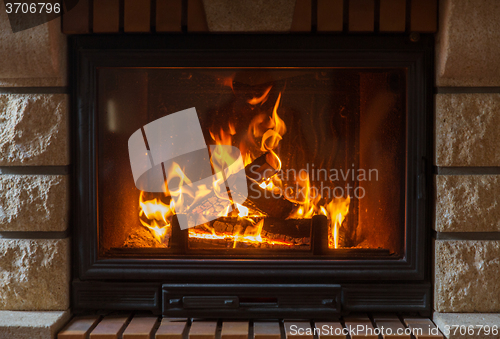 Image of close up of burning fireplace at home