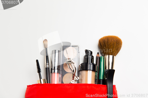 Image of close up of cosmetic bag with makeup stuff