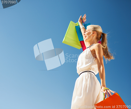 Image of woman with shopping bags