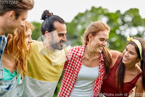 Image of group of smiling friends outdoors